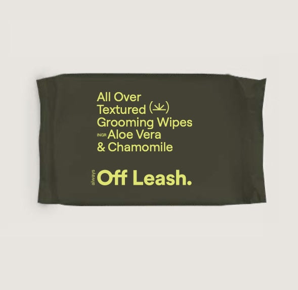 Green packaging with yellow text for 'Off Leash' grooming wipes on a white background