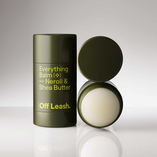Green container of 'Everything Balm' with a white ball inside, featuring 'Always Off Leash' branding.