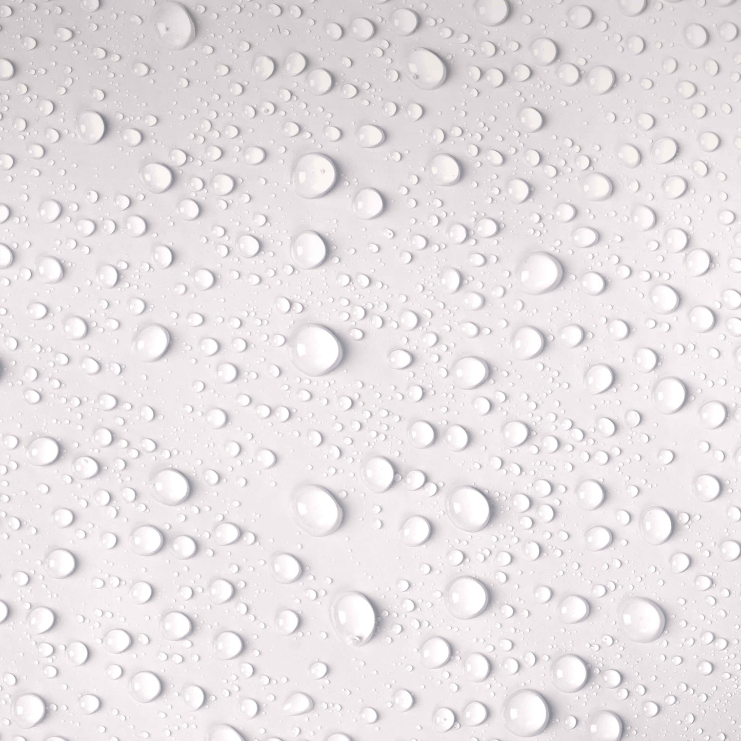 Pattern of water droplets on a white surface